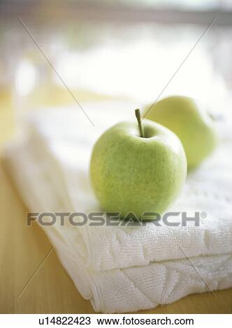 Green apples on towel View Large Photo Image Stock Image - Green apples on towel. Fotosearch