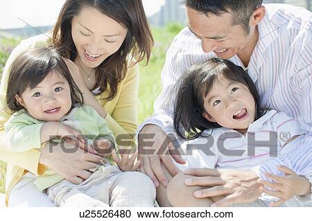 Happy Family of Four View Large Photo Image Stock Image - Happy Family of Four. Fotosearch