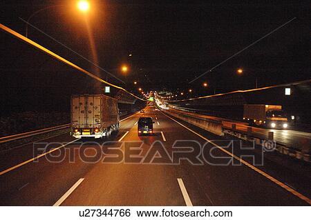 Stock Photograph - Highway at night, Osaka Prefecture, Japan. Fotosearch