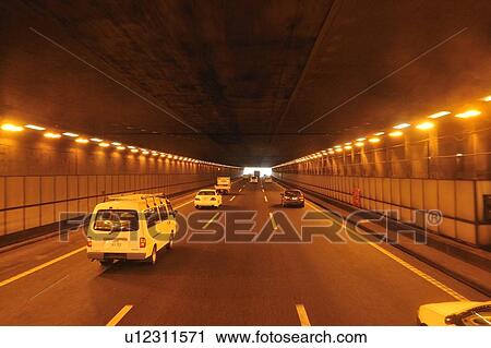 Stock Image - Highway under Yamato tunnel, Kanagawa Prefecture, Japan. Fotosearch