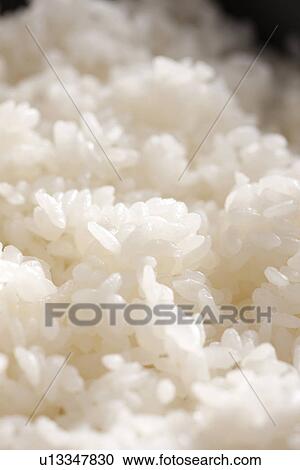 Stock Image - Hot cooked rice. Fotosearch