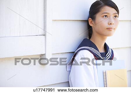 Stock Image - Junior High School girl looking away. Fotosearch