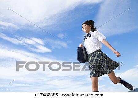 Junior High School girl running View Large Photo Image Stock Photography - Junior High School girl running. Fotosearch