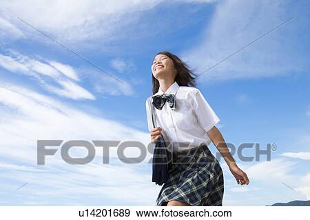 Junior High School girl with eyes closed View Large Photo Image Stock Photo - Junior High School girl with eyes closed. Fotosearch