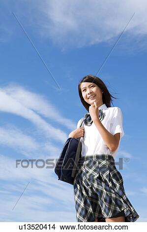 Junior High School girl with shoulder bag View Large Photo Image Picture - Junior High School girl with shoulder bag. Fotosearch