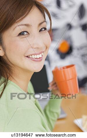 Mid Adult Woman Having Tea View Large Photo Image Stock Photo - Mid Adult Woman Having Tea. Fotosearch