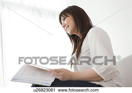 Mid Adult Woman Reading Book View Large Photo Image Stock Image - Mid Adult Woman Reading Book. Fotosearch