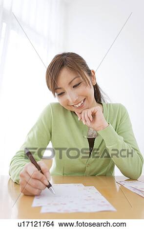 Mid Adult Woman Writing Letter View Large Photo Image Picture - Mid Adult Woman Writing Letter. Fotosearch