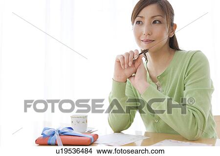 Mid Adult Woman Writing Letter View Large Photo Image Picture - Mid Adult Woman Writing Letter. Fotosearch