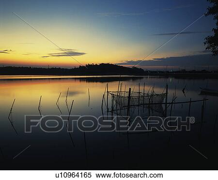 Stock Photography - Morning at Lake Sanaru. Fotosearch