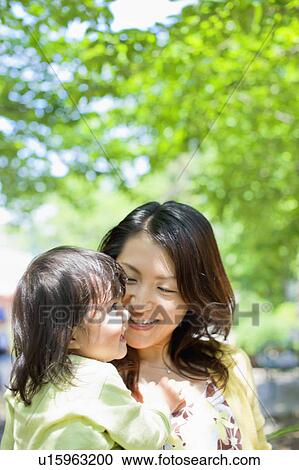 Mother and Daughter in Park View Large Photo Image Stock Image - Mother and Daughter in Park. Fotosearch