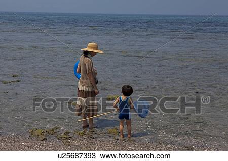 Mother and Son at Beach View Large Photo Image Stock Image - Mother and Son at Beach. Fotosearch