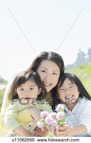 Mother with Two Daughters View Large Photo Image Stock Image - Mother with Two Daughters. Fotosearch