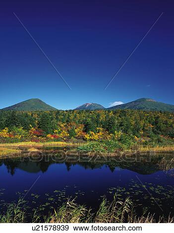 Stock Photo - Mount Hakkoda and Pond in Autumn. Fotosearch