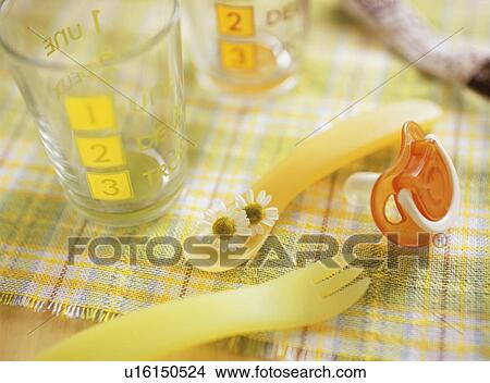Picture - Pacifier, spoon, fork and glass. Fotosearch