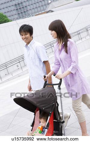 Parents Pushing Buggy View Large Photo Image Stock Image - Parents Pushing Buggy. Fotosearch