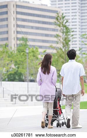 Parents Pushing Buggy View Large Photo Image Stock Image - Parents Pushing Buggy. Fotosearch