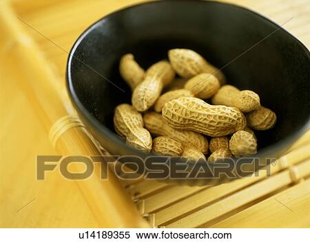 Stock Photography - Peanuts in a bowl. Fotosearch