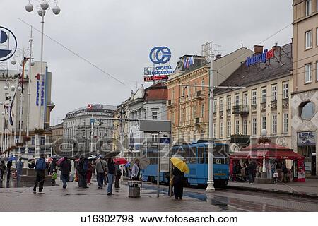 Stock Photo - People at Tram Stop. Fotosearch