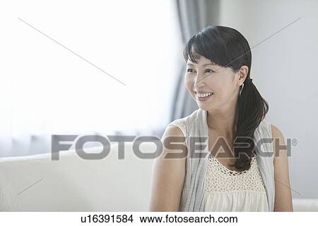 Picture - Portrait of Mid Adult Woman. Fotosearch