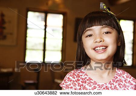 Stock Image - Portrait of Young Girl. Fotosearch
