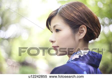 Stock Photography - Portrait of Young Woman in Yukata. Fotosearch