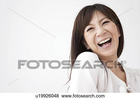 Stock Photo - Portrait of Young Woman. Fotosearch