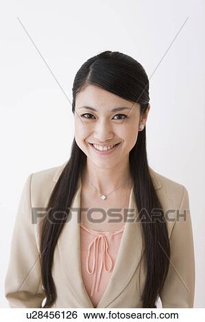Stock Photograph - Portrait of young woman. Fotosearch