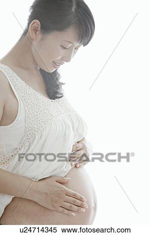Pregnant Mid Adult Woman View Large Photo Image Stock Photography - Pregnant Mid Adult Woman. Fotosearch