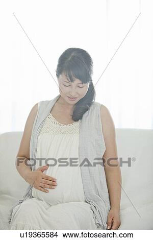Picture - Pregnant Woman. Fotosearch