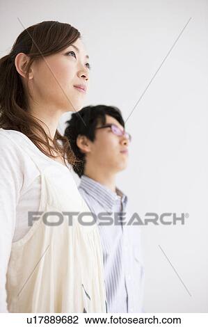 Profile of young couple View Large Photo Image Stock Image - Profile of young couple. Fotosearch