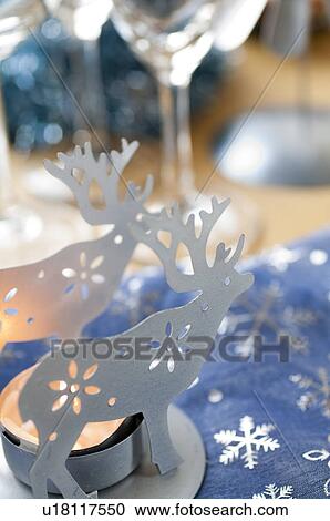 Stock Image - Reindeer candle holder. Fotosearch