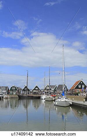 Stock Image - Saibloats Moored at Harbour. Fotosearch