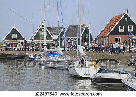 Stock Image - Sailboats Moored at Harbour. Fotosearch