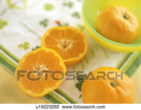 Sliced tangerine View Large Photo Image Stock Image - Sliced tangerine. Fotosearch