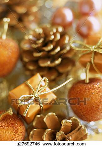Small gifts, pine cones and small apples View Large Photo Image Stock Photograph - Small gifts, pine cones and small apples. Fotosearch