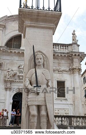 Stock Photography - Statue at Luza Square. Fotosearch