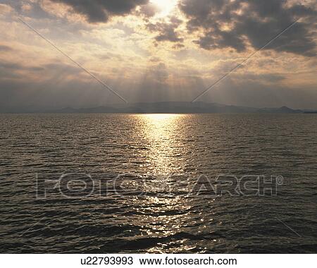 Sun Breaking Through Clouds Over Lake View Large Photo Image Stock Image - Sun Breaking Through Clouds Over Lake. Fotosearch