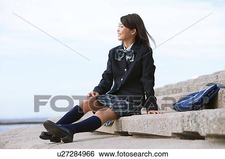 Teenage Schoolgirl Sitting on Steps at Coast View Large Photo Image Stock Photograph - Teenage Schoolgirl Sitting on Steps at Coast. Fotosearch