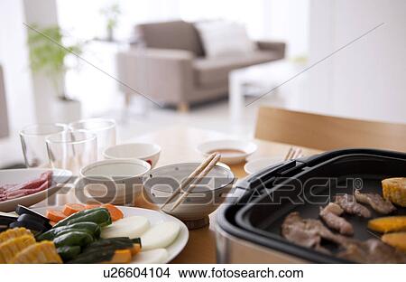 Picture - Teppanyaki on Dinner Table. Fotosearch