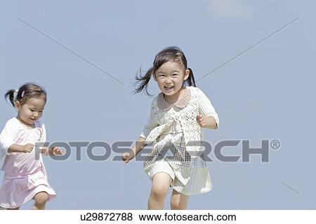 Stock Photo - Two Girls. Fotosearch