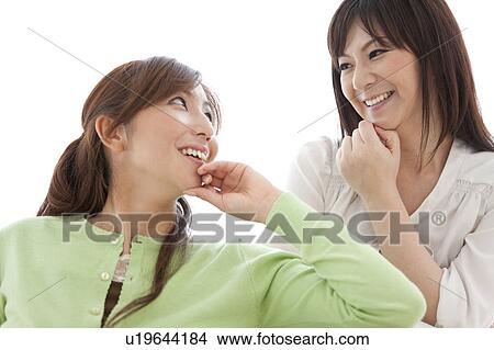 Two Mid Adult Female Friends Talking View Large Photo Image Picture - Two Mid Adult Female Friends Talking. Fotosearch