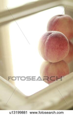 Two Peaches on Mirror View Large Photo Image Stock Image - Two Peaches on Mirror. Fotosearch