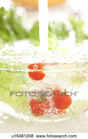 Stock Photo - Vegetables in a glass bowl. Fotosearch