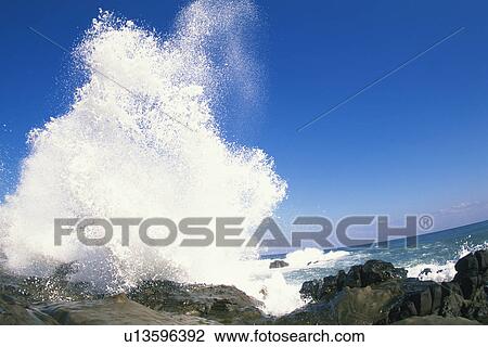 Wave Splashing Against Rocks View Large Photo Image Stock Image - Wave Splashing Against Rocks. Fotosearch