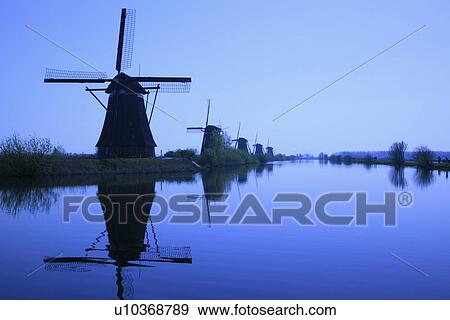 Windmill in Silhouette View Large Photo Image Stock Photo - Windmill in Silhouette. Fotosearch