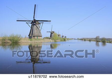 Stock Image - Windmills at Riverside. Fotosearch