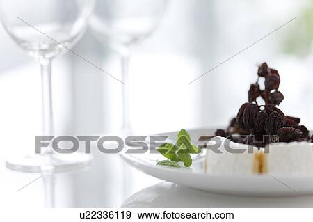 Wineglasses and Cheese with Raisings View Large Photo Image Stock Photo - Wineglasses and Cheese with Raisings. Fotosearch