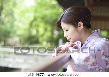 Woman in Yukata Looking Over Balcony View Large Photo Image Picture - Woman in Yukata Looking Over Balcony. Fotosearch