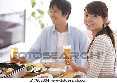 Young Couple Eating Dinner View Large Photo Image Picture - Young Couple Eating Dinner. Fotosearch